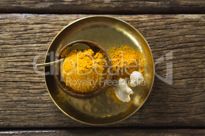 Turmeric powder in plate