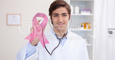 doctor with pink breast cancer awareness 3d ribbon