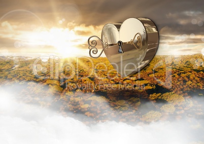 3D Heart box Key floating over landscape sunset
