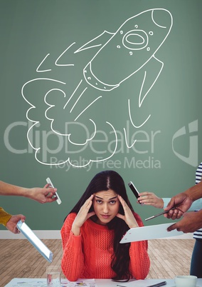 Creative but stressed woman with hand-drawn rocket