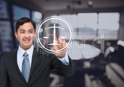 smiling businessman pointing at justice icon