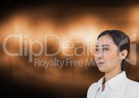 Businesswoman thinking over brown background
