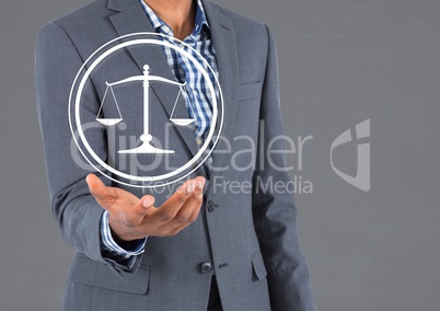 businessman holding justice icon