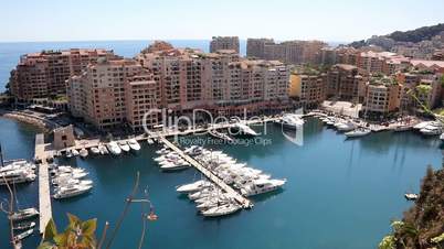 Boats moored in marina in Fontvieille quarter or district of Principality of Monaco.