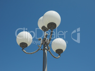 street lamp over blue sky