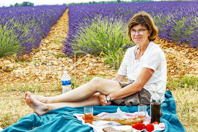 Woman at picnic at lavender field