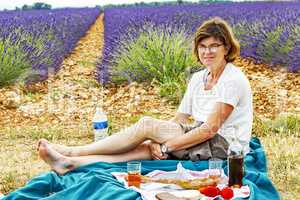 Woman at picnic at lavender field