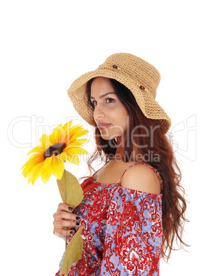 Closeup of woman with a sunflower