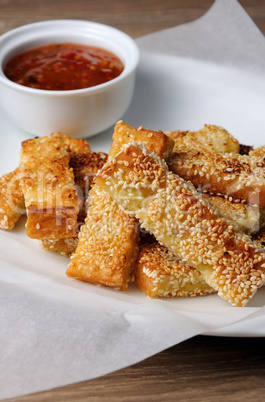 Cheese bread sticks in sesame