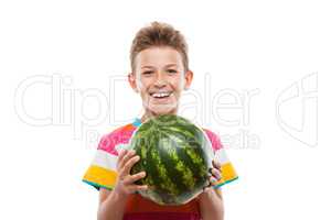 Handsome smiling child boy holding green watermelon fruit