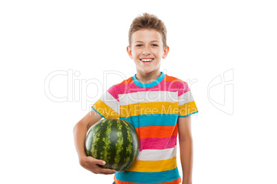 Handsome smiling child boy holding green watermelon fruit