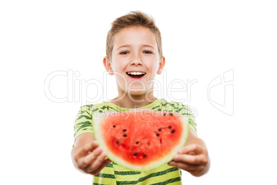 Handsome smiling child boy holding red watermelon fruit slice