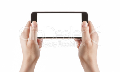 Young girl hands holding black smart phone on white