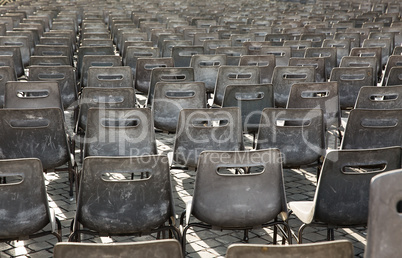 Rows of empty chairs.
