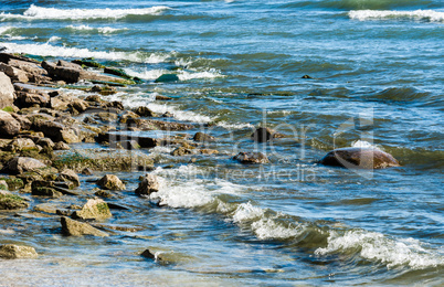 Rocky shore with incoming waves.