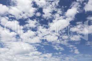 Blue sky and white fluffy clouds.