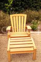 Wood patio lounge chairs in the backyard