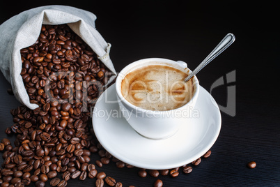 Coffee cup and beans