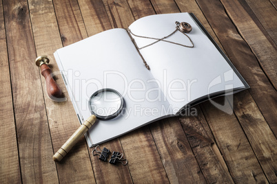 Book, magnifier, stamp and clock