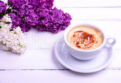 Cappuccino in a white cup and saucer