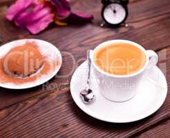 espresso in a white cup with saucer