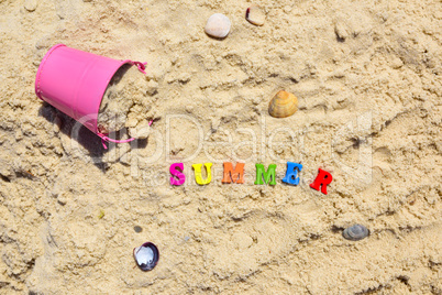word summer from multicolored wooden letters
