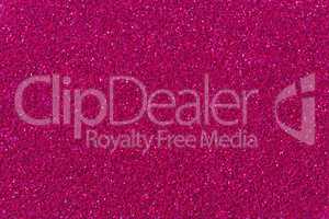 Crimson glitter background texture.