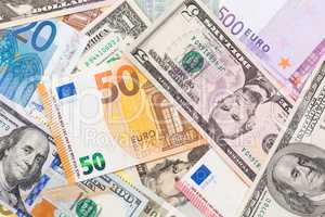 US dollar and euro banknote money.