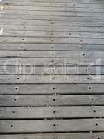Rustic floor of horizontal parallel wooden boards with texture