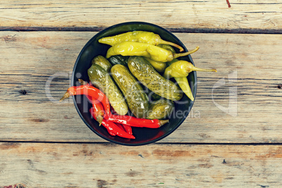 American traditional snack. Pickled cucumbers and salted hot chilli pepper