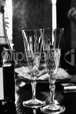 Champagne in glasses and in a bottle on the table in a restaurant