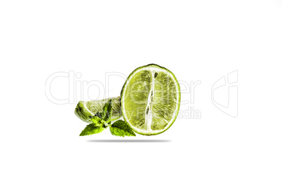 Lime. Fruit slices and mint isolated on a white background