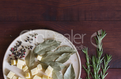 Bay leaf with cheese and rosemary. View from above