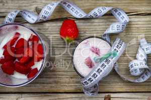 Healthy eating. Fitness. Milk shake with strawberry slices
