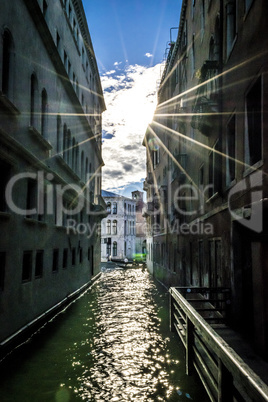 Scenic canal with gondolas, Venice, Italy.
