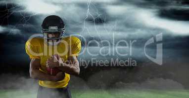 american football  player standing on the field with lightning