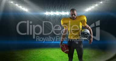 american football  player standing in stadium