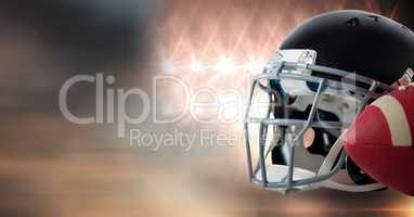 American football helmet and ball gear with stadium lights transition