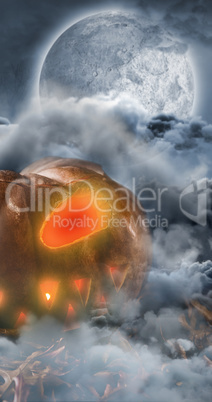 Composite image of jack o lantern with leaves on table