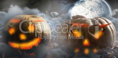 Composite image of leaves with jack o lantern on table