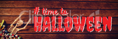 Composite image of digital composite image of time to halloween text