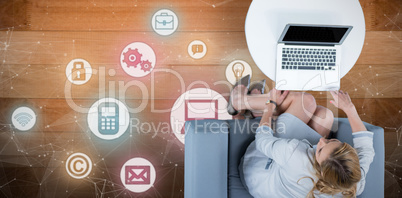 Composite image of woman on her laptop