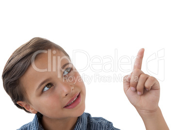 Boy standing against white background