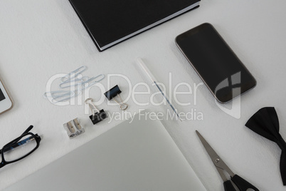 Various office accessories on white background