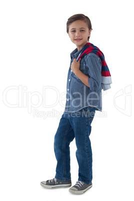 Boy posing against white background