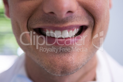 Man smiling at dentist office