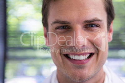 Close up portrait of smiling doctor