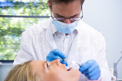 Close up of doctor examining patient