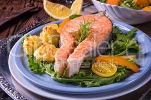 salmon with butter fried potato puree and salad