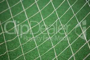 Football goalpost against artificial grass
